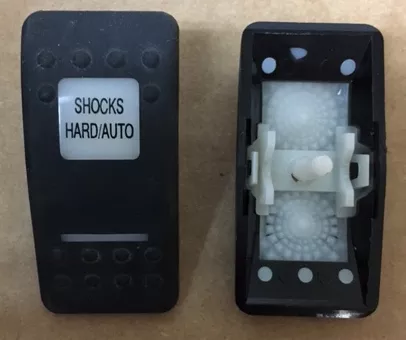 “Shocks Hard/Auto” Switch Faceplate Contura II